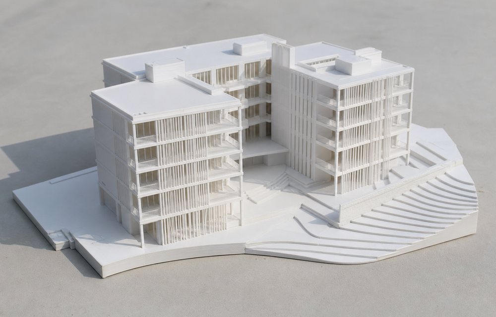 3D printed white architectural scale model of a building