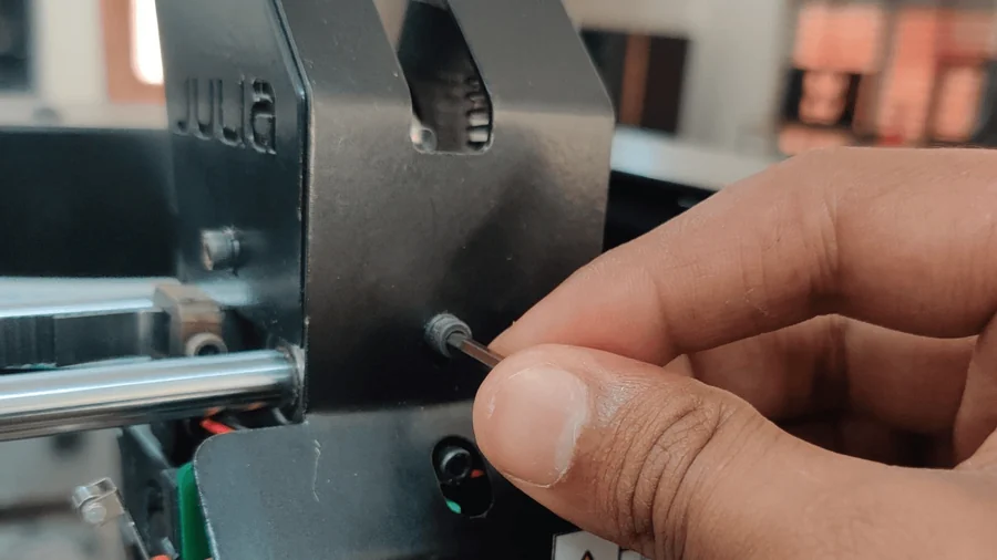 A Fracktal Julia print head being serviced by hand