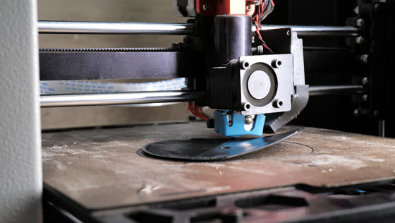 A part on a heated bed with its edges curling away from the plate