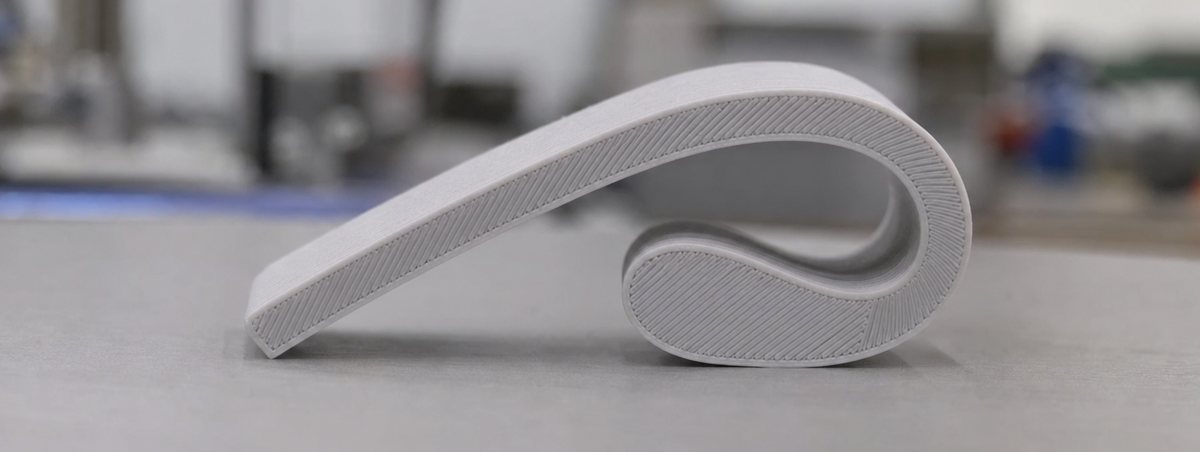 A flexible printed part bent double