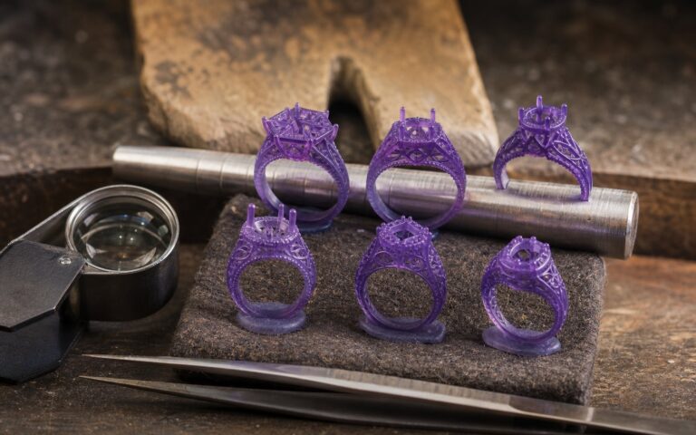 3D printed castable ring patterns on a jeweller's bench